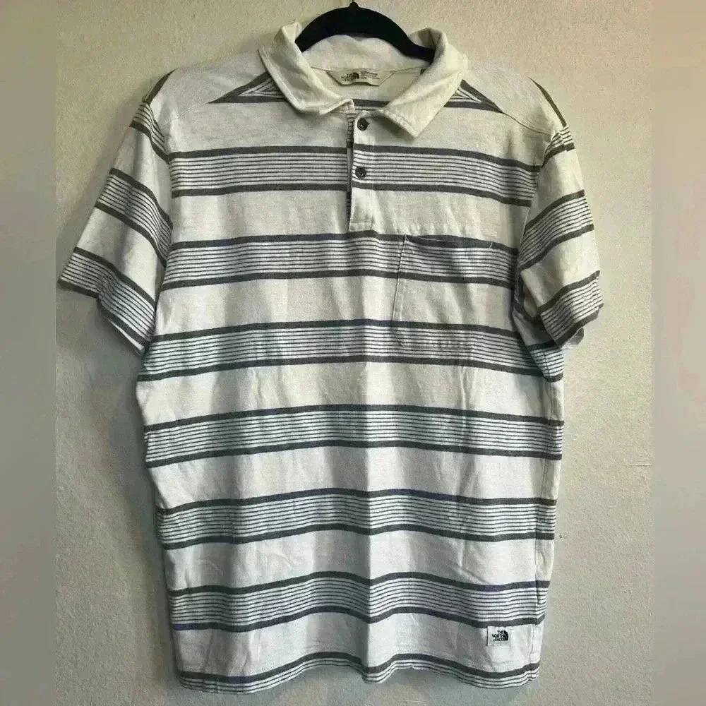 The North Face Men’s short sleeve stripe The North Face polo shirt size M